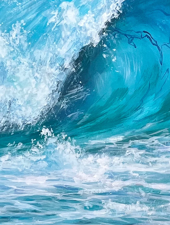Close detail: the curling lip of the wave, dark green under the crest, white foam tearing off the top edge