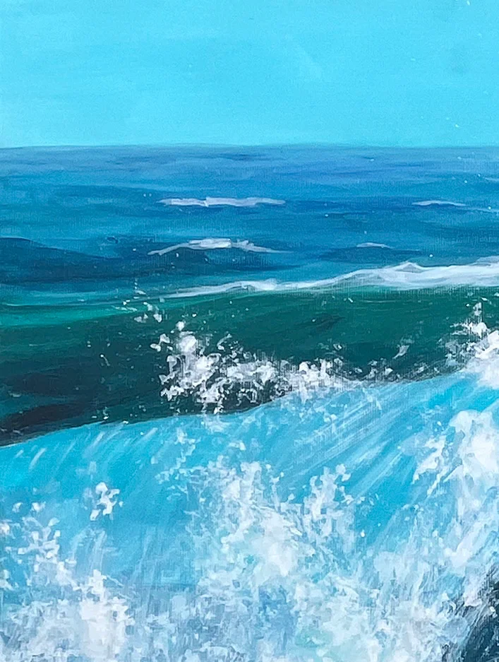 Close detail: the open sea beyond the wave, bands of deep blue and green under a pale sky
