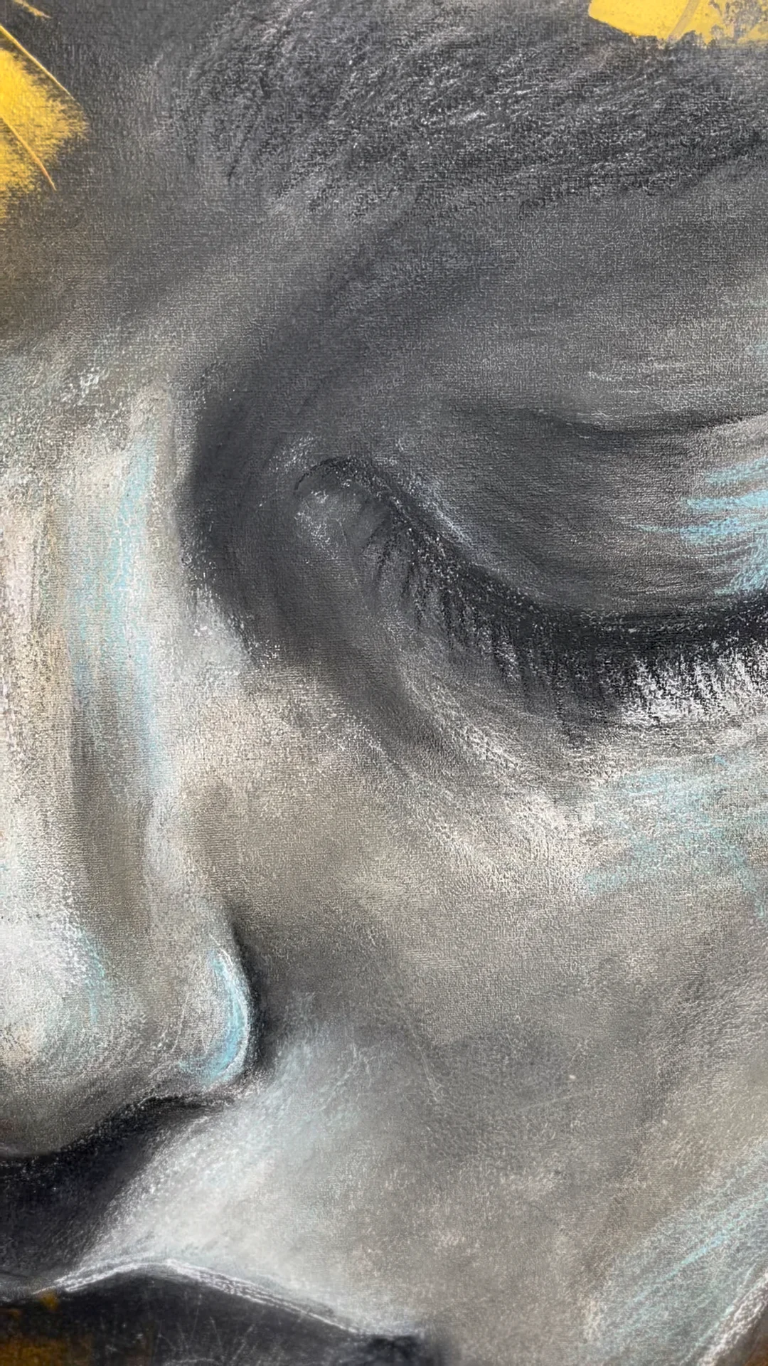 A short silent close-up video of the painting Face by Natalie Streit, the camera moving slowly over the closed eye and the soft grey shading